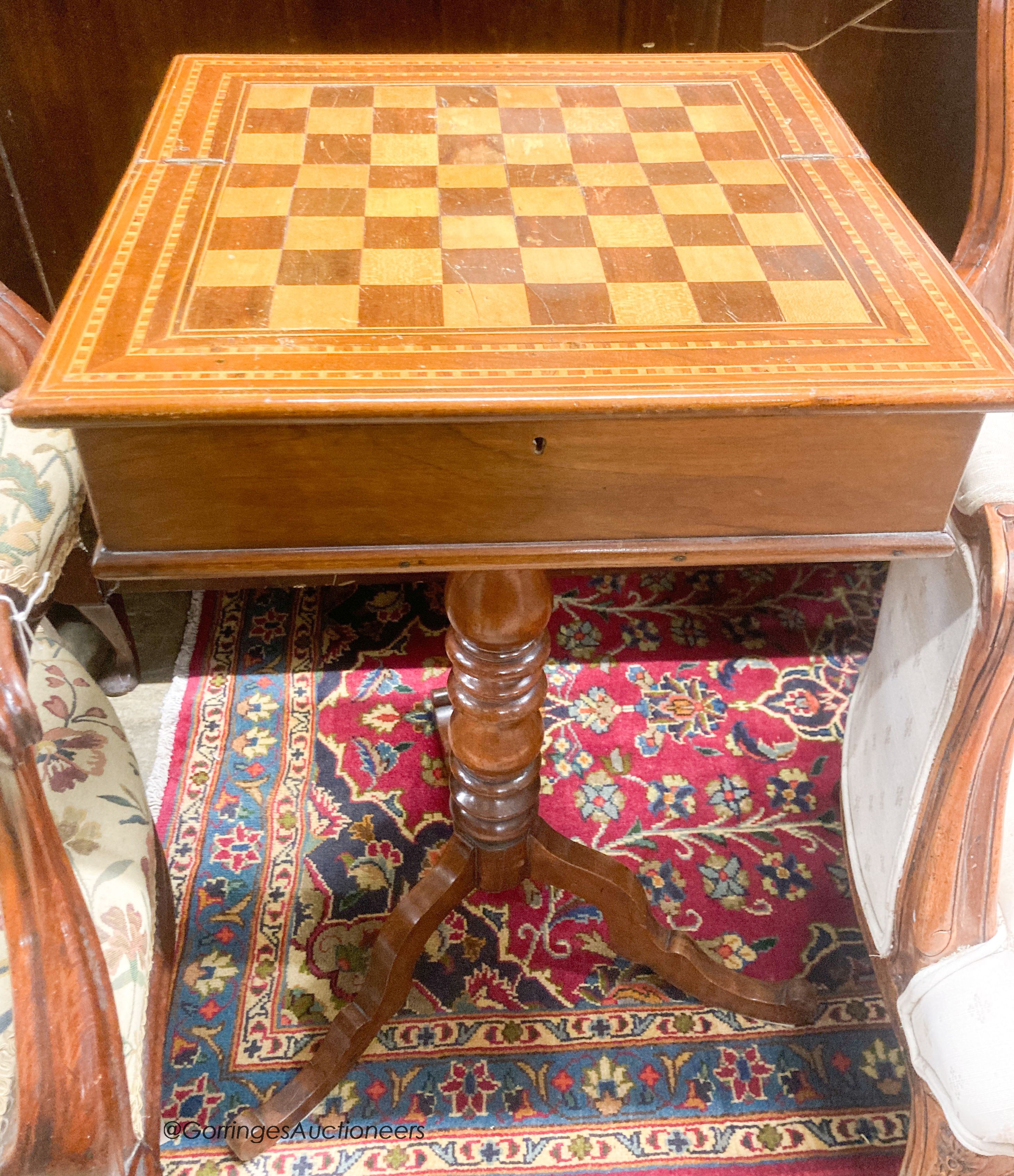 A mahogany games table, width 40cm, depth 40cm, height 74cm